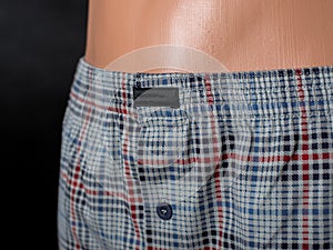 Men`s underpants on a mannequin. On an isolated