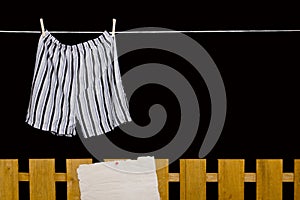 Men's underwear hanging on a clothesline