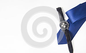 Men`s watch and tie on white background. Men`s accessories on white background
