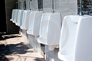 Men`s white urinals design