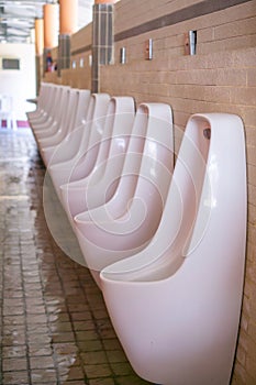 Men`s white urinals design