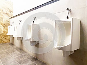 Men`s white urinals design, Close up row of outdoor urinals men public toilet