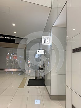 men\'s and women\'s restrooms lobby Bahrain airport, public area without people, beautiful modern european airport hall