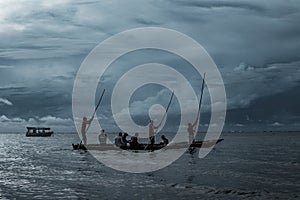 Men Sailing Rowling Boat In Indian Ocean Mombasa City County Kenya East African