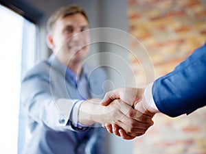 Men shaking hands. Confident businessman shaking hands with each other.