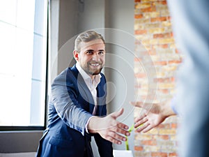 Men shaking hands. Confident businessman shaking hands with each other.