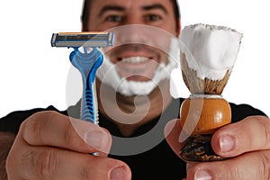 Men with shaving brush and razor