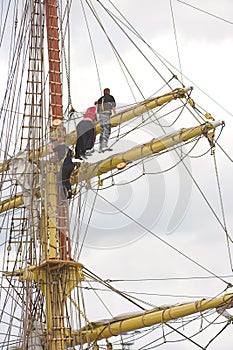 Men on ship mast