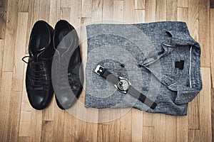 Men shoes shirt and wristlet watch