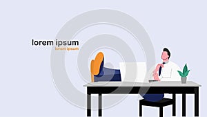 Men sit casually in front of the laptop while raising their feet on the table. photo
