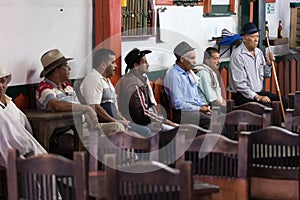 Men sitting inside a bar in Salento Colombia