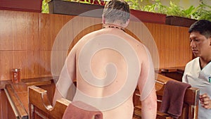 Men At A Spa Getting Inside Steam Boxes