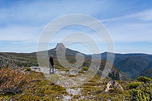 Men stand up in Cradle Mountain, in Tasmania, Australia