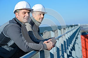 men standing at natural gas facility