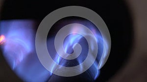 Men Turns Valve and Enable Blue Flames of Gas Burning Inside of a Boiler. 4K UltraHD, UHD