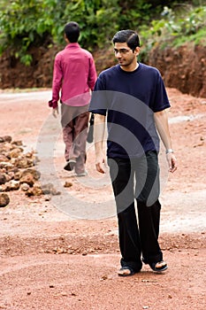 Men walking opposite direction