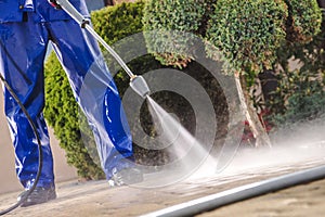 Men Washing Garden Paths