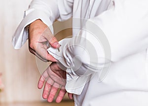 Men wear a shirt and cufflinks close-up