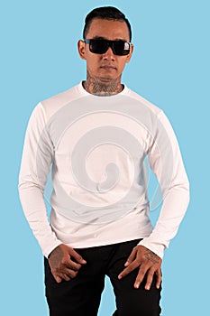 Men wearing white long sleeve t shirt isolated on background.