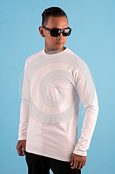 Men wearing white long sleeve t shirt isolated on background.