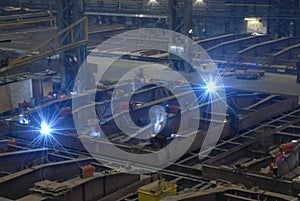 Men Welding steel at shipyard