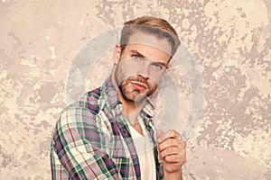 Men with well-groomed hair. barbershop concept. sexy guy casual style. macho man grunge background. male fashion spring