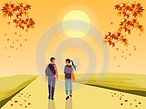 Couple carrying bags on the way.maple autumn on top .yellow sun  and yellow sky background