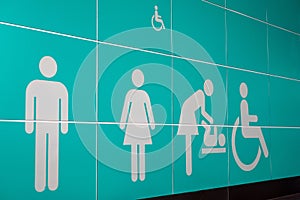 Men and women,child and handicapped symbols toilet or restrooms signs at airport