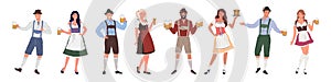 Men and women Oktoberfest characters in German costumes