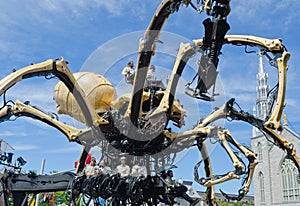 Men and Women operating a Giant Spider Kumo in Ottawa