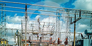 Men at work electricity distribution primary substation workers