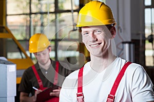 Men during work at factory