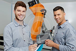 men working in electronics factory