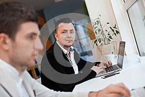 Men working in startup center