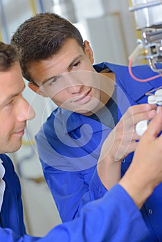 Men working on wirings