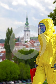 Men in yellow protective hazmat suit.