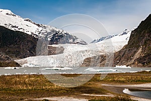 Menden Hall Alaska Glacier view from the back with grass photo