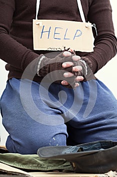 Mendicant begging for help