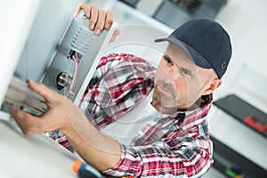 Mending the broken appliance photo