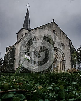 A menhir in front of a church