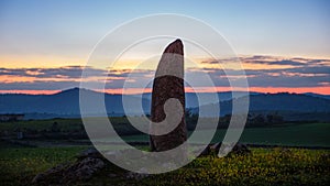 Menhir in spain at the fall of the sun