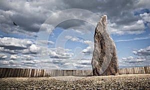 Menhir A stone man near village Klobuky in the Czech Republic