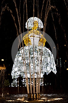 Menina. Menina de luz decorating the streets of the city of Madrid at Christmas time.
