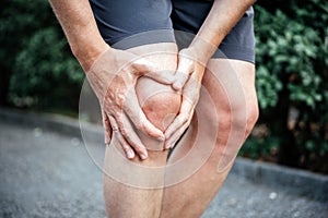 Meniscus tear in man athlete& x27;s knee, sports injuries concept