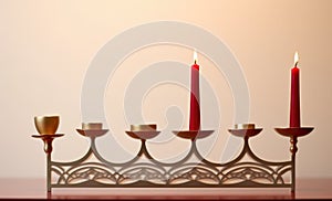 A menorah with five lit candles on a table. AI.