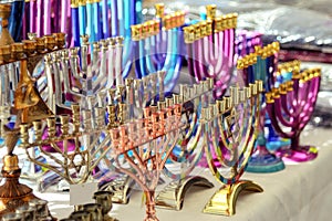 Menorah of Hanukkah traditional candelabra at the stand of souvenir and present gift shop, Netanya, Israel.