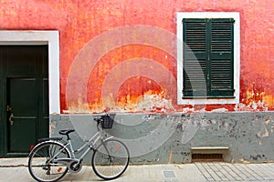 Menorca Ciutadella red grunge facade texture photo