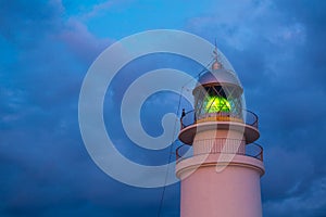 Menorca sunset at Faro de Caballeria Lighthouse photo