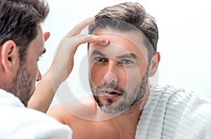 Mens beauty cosmetics, male beauty and skincare. Morning healthcare and hygiene for man. Perfect beauty skin. Handsome