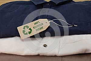 Mens shirts with Recycle clothes icon on label with 100% Recycled fabric